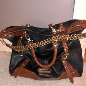 PRICE DROP: Steve Madden Black and Tan bag